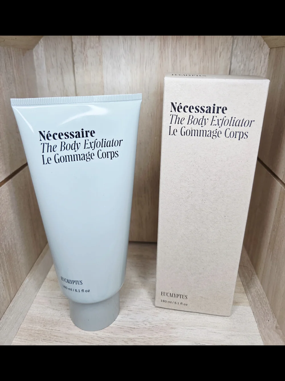 Nécessaire The Body Exfoliator in the Eucalyptus scent (6.1 fl oz / 180 ml).